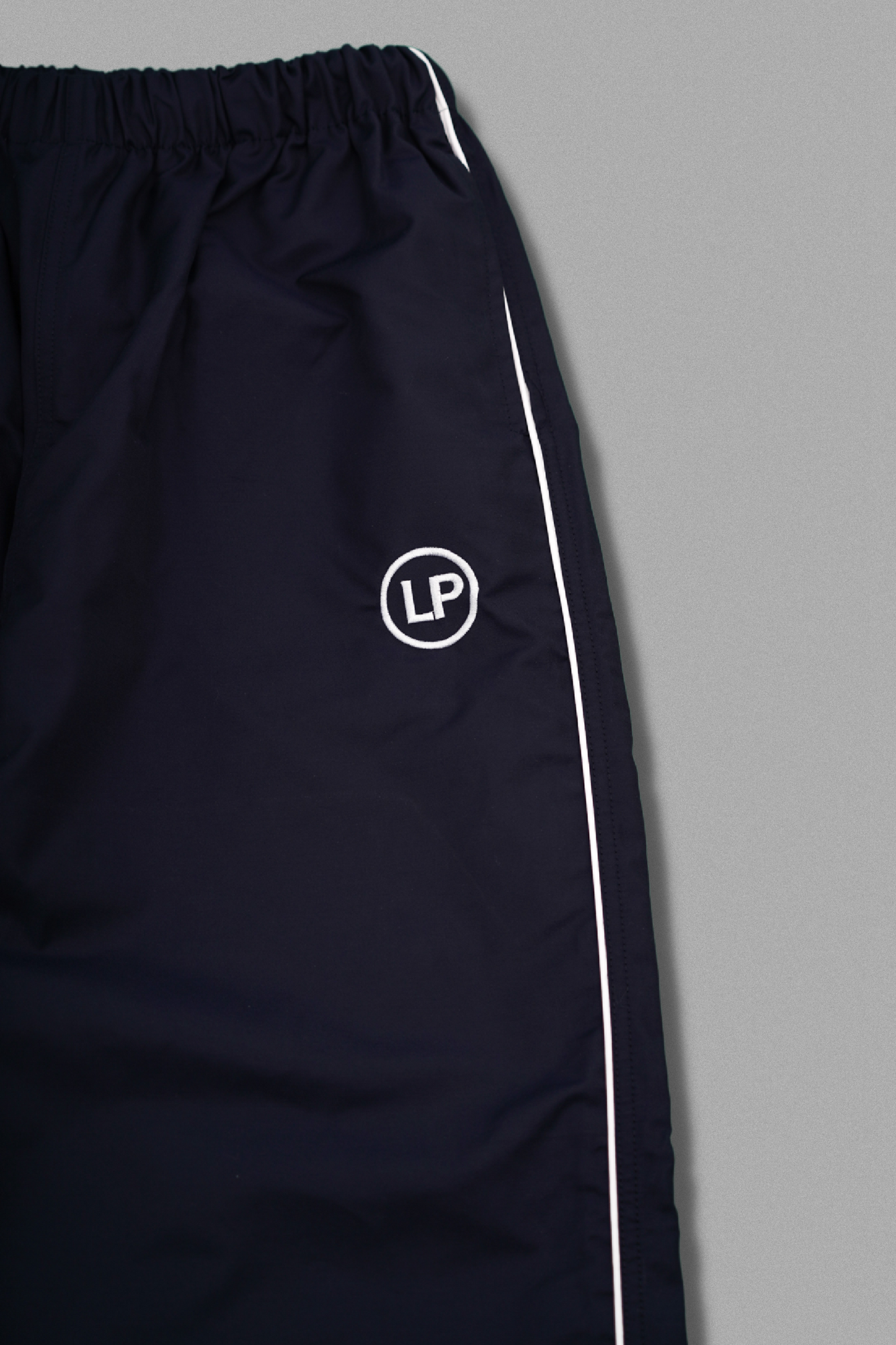 LP NYLON TRACK PANTS